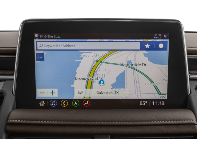 View of the infotainment system displaying GPS and other vehicle safety features in a 2024 GMC Yukon