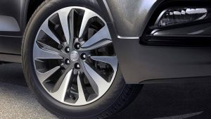 A nice side profile of the passenger side front wheel and fender area.